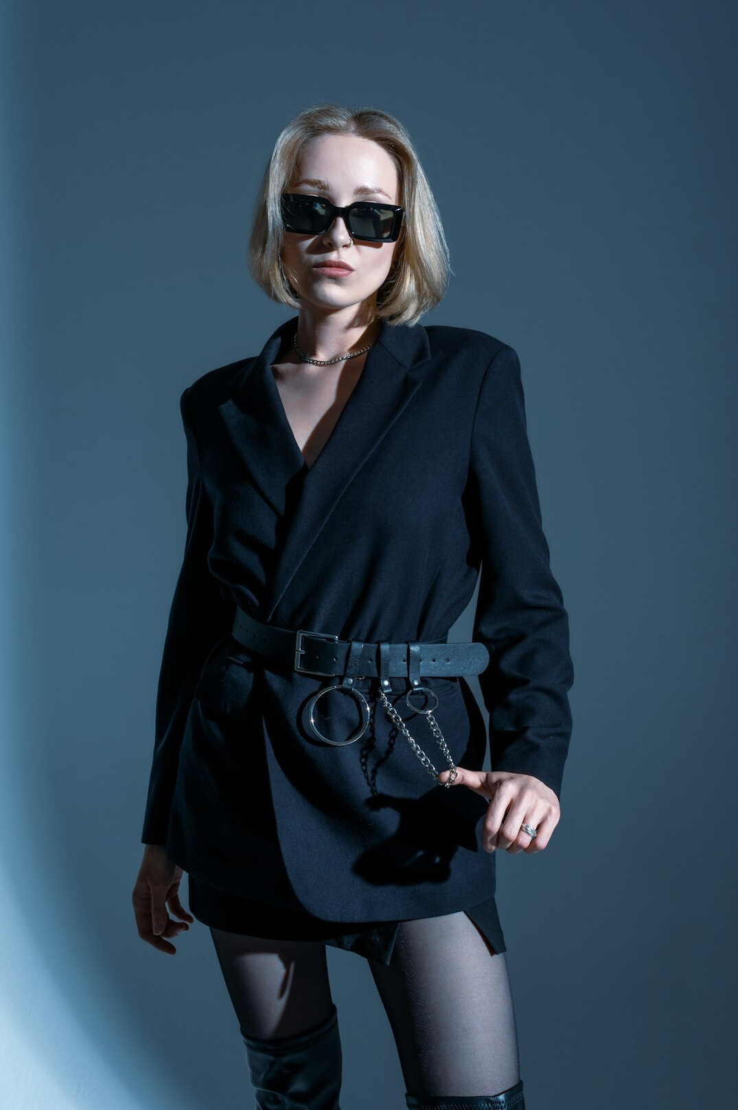 Studio portrait of a European businesswoman lecturer in a navy blazer